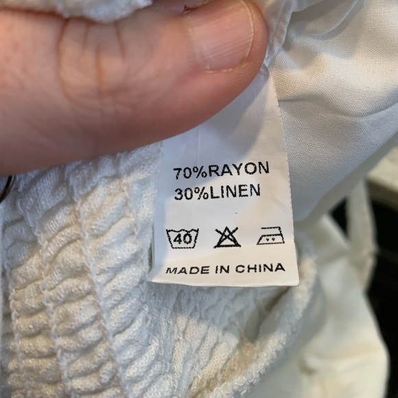 Elegant White One Shoulder wide leg pant jumpsuit with pockets - Picture 3 of 3